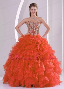 Pretty Ball Gown Sweetheart Ruffles and Beaded Decorate Coral Red Quinceanera Gowns