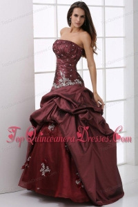 A-line Burgundy Strapless Beading and Appliques Quinceanera Dress