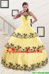 2015 Light Yellow Popular Quinceanera Dress with Appliques and Ruffled Layers