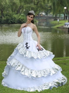White Quinceanera Dress With Silver Trim And Black Applique