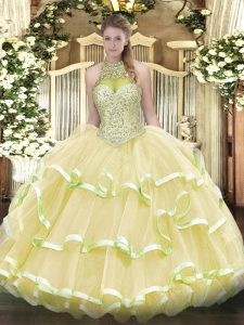 Deluxe Light Yellow Halter Top Neckline Beading and Ruffled Layers Quinceanera Dress Sleeveless Lace Up