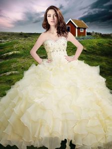 Best Selling Sleeveless Organza Floor Length Lace Up Sweet 16 Dresses in Light Yellow for with Beading and Ruffled Layers
